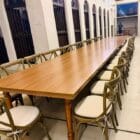 cross back chair with wooden table for rental purpose