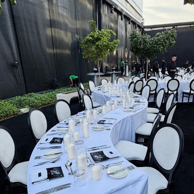 curve dining table rental